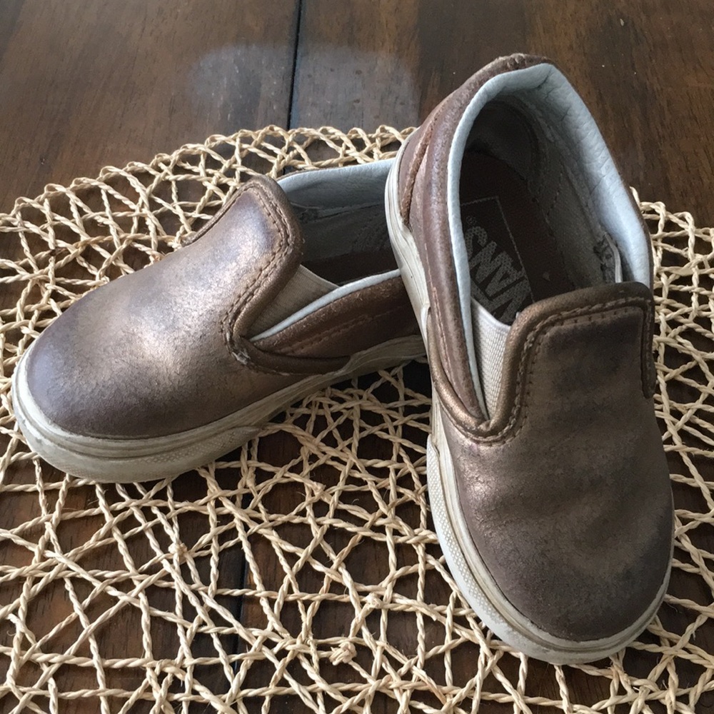 Toddler gold slip on vans.